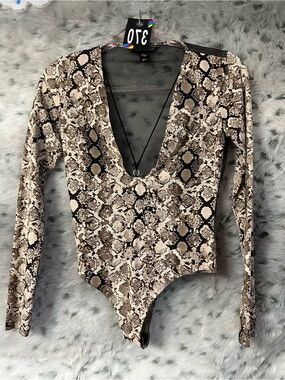 179.  Vs small bodysuit snakeskin like new